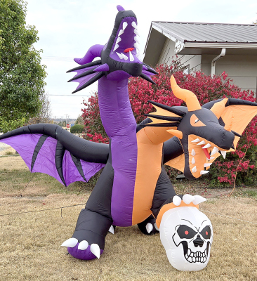 BEWARE of this two-headed dragon on Halloween night! His favorite candy bars are Snickers!