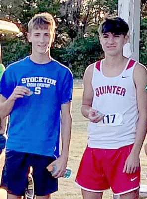 STOCKTON CONNECTION—Johnny Hamel (left), who placed first at Ness City last Thursday, and his second-place competitor, Eli Gruenbacher of Quinter, have a Stockton connection, as Eli’s mother, Shelly (Steeples) Gruenbacher is a Stockton High School graduate. Hamel won the race with a time of 18:44. (Courtesy Photo)