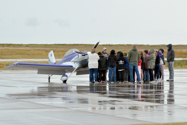 THE WET WEATHER put a damper on the Fly Kansas Air Tour, which was held on Friday, October 7th at the Rooks County Regional Airport. The Plainville students still enjoyed looking at the planes that did touch down at the facilities before they took off for their last stop in Hays.