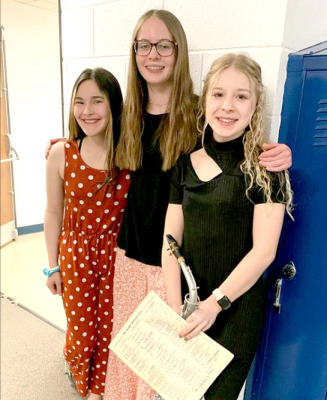 SOME of the students performing their vocal solos at the MCEL Music Festival held in Norton on Wednesday, February 23rd were (from left): Mya Trevino, Cheyenne Hoeting and Saj Snyder.