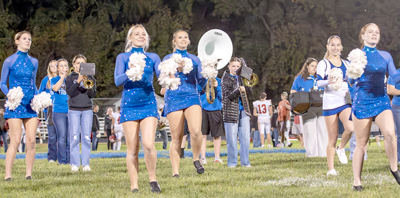 THE STRIDERS, CHEERLEADERS and Band performed a number together last Friday night, much to the delight of those attending the Stockton vs. Hill City football game at Tiger Stadium.