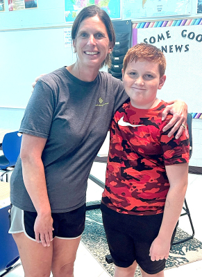 TAKING IN THE FUN at the SGS Open House on Tuesday, August 20th, were teacher Laura Moffett and Corbin Kooley.