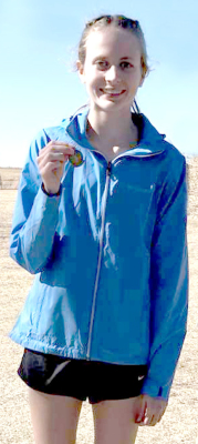CHEYENNE HOETING placed seventh at Regionals, qualifying herself for the state cross country meet with a time of 20:55.64. ( Courtesy Photo)