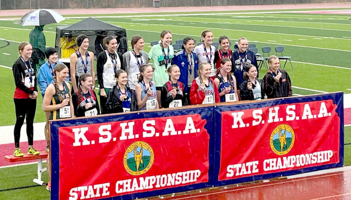 CHEYENNE HOETING (back row, middle) was among the 20 runners making the podium after placing 15th at the 2024 KSHSAA 1A Cross Country State Championship in Wamego.