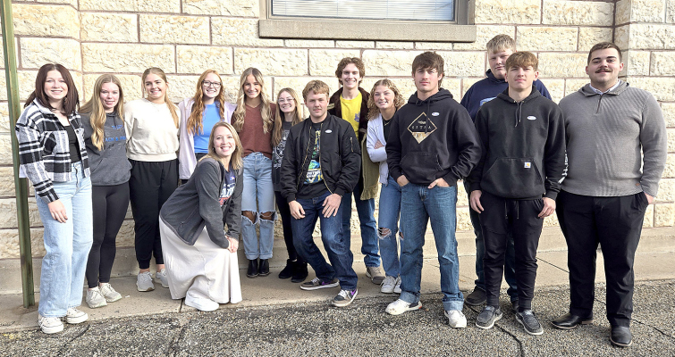 LEARNING ABOUT THE VOTING PROCESS at the Stockton City Hall polling site is Stockton High School teacher Michelle Towery’s government class. This year three from this group were first time voters. Pictured are (from left to right) Ryleigh Gardner, Katlyn Couse, Brin Muir, Ella Snyder, Ava Dix, Jozie Ludy, Deacon Creighton (first time voter), Holden Burton, Ashlyn Hahn, Emerson Lowry (first time voter), Taylor Inglsbee, Cason Iwanski (first time voter), and Jaxon Dunlap. Towery is kneeling in front.