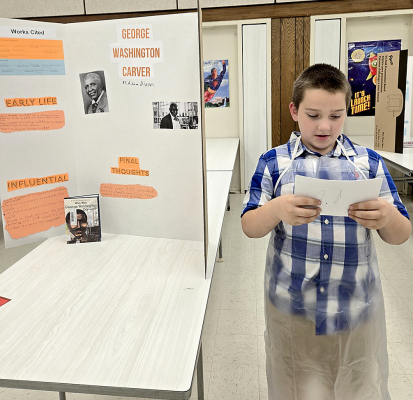 Adam Dixon as George Washington Carver