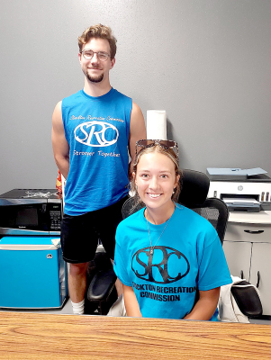 HELPING OUT Stockton Rec Director Aubree Dewey this summer with the ballgames and at the facility are college interns Layton Colburn and Claire Plumer.