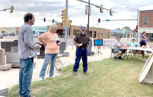 MATT MILLER (AT LEFT), THE ARTIST FROM HAYS