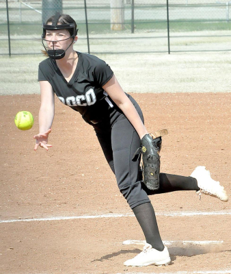CORYN HAHN delivers a pitch to home plate vs. Ness City.