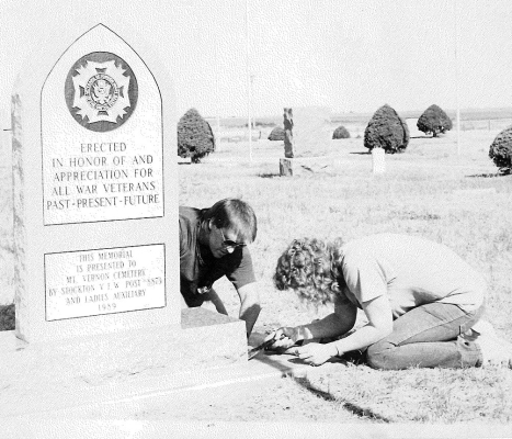IN 1989, Smith Monuments set a memorial to honor all the war veterans, past, present, and future, at the Mt. Vernon Cemetery just before Memorial Day. Pictured are Bill Lutey and Wendy Hake.