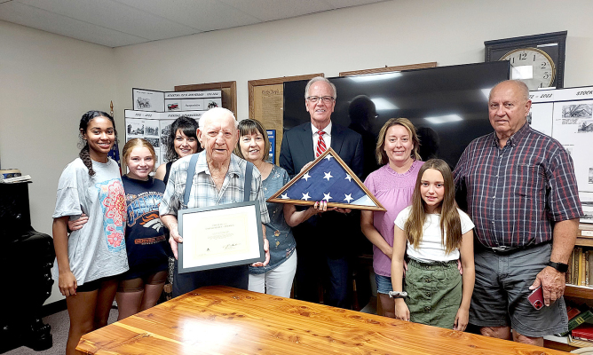 FAMILY MEMBERS at the Flag Presentation for WWII Veteran Kenneth Miller were:Aaleyah Becker, Aidyen Kerr, Jesica Kerr, Kenneth Miller, Addie Foster, Senator Jerry Moran, Kacy Becker, Kaylyn Becker, and Ed Foster.
