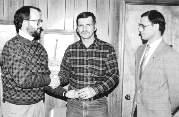 RECEIVING HIS TEN-YEAR AWARD