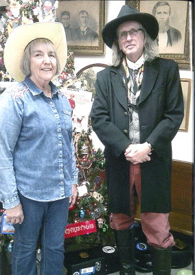 BETTY BURLINGHAM, the 2024 Champion of the Kansas Cowboy Poetry Contest in both the serious and humorous categories, and cowboy balladeer Zerf, a singer/songwriter and Manhattan native, were at the Rooks County Historical Museum on Sunday, December 7th, for the third annual Cowboy Christmas Poetry Gathering. The Friends of Cottonwood Ranch sponsored the event. (Photo Courtesy of Linda Melton.)