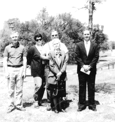 AN OAK TREE was planted in the Stockton City Park in memory of Wayne “Mac” McCaslin in 1991. Pictured at the dedication were Leo Bird, who had selected the tree; Janet and Leo Kollman, who donated the tree from their farm; Mabel McCaslin, Wayne’s wife; and Ed Hageman, president of the Stockton Rotary Club.
