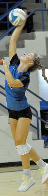 AVA DIX, a sophomore, executes a successful jump serve during action against Hoxie at the triangular held at Stockton last Tuesday.