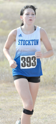 RYLEIGH GARDNER heads for the finish line at last Thursday’s cross country meet held at Webster State Park.