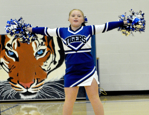 AIDYEN KERR helps pump up the crowd at Tiger Nation Bash.
