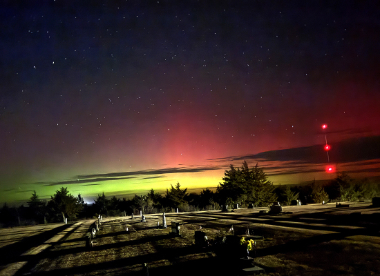 northern lights from cemetery