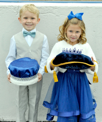 LOOKING LIKE A FUTURE KING AND QUEEN are the Homecoming crown bearers Carson Riener and Owen Muir.