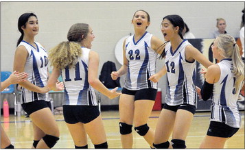 Jayana Creighton, Temprance Northup, Shae Yohon, Jalia Creighton and Saj Snyder celebrate vs. Hoxie JV