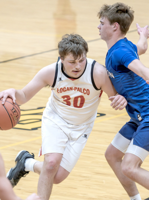 Logan/Palco’s Carson Knipp is defended by Stockton’s Jace Kesler