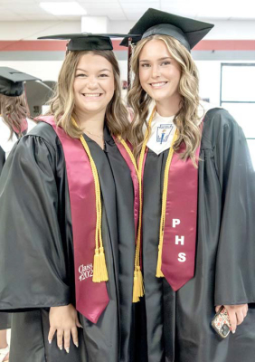 Plainville Seniors Caydance Carter and Chasey Bittel prior to the PHS Commencement Ceremony