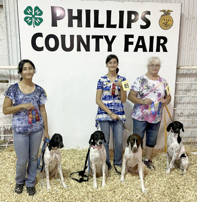 KATHY CREIGHTON AND KC, Jalia Creighton Lucy and Sam, and Jayana Creighton and Rocky showed Showmanship, Agility, and Obedience at the Phillips County Fair, Phillipsburg July 30. Kathy and KC received 1st and Top Blue in Agility and Grand Champion in Showmanship. Jalia and Lucy received a red ribbon in Showmanship, a white ribbons in Obedience and Agility. Jayana and Rocky received a blue ribbon in Showmanship and red ribbons in Obedience and Agility.