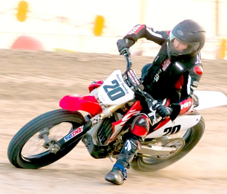 HUNTER TOWNLEY OF LINCOLN will be among the flat track motorcycle racers who will be competing on Rooks County’s half-mile oval this Friday and Saturday.The 12-year-old, shown racing in Oberlin, has had a successful season on the track, either winning or placing in the top three in most of his races. Hunter just recently added a 450R Honda to his fleet, and already picked up a win on the new bike. Attend the races at the Rooks County Free Fair and cheer him on! Photo Courtesy of James Briery