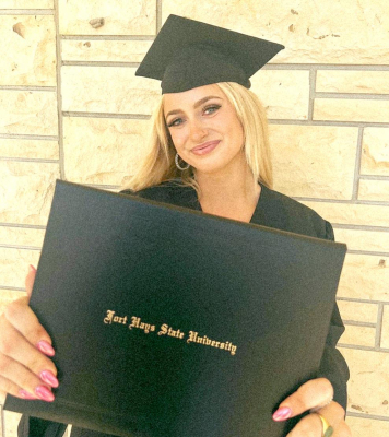 Receives Degree