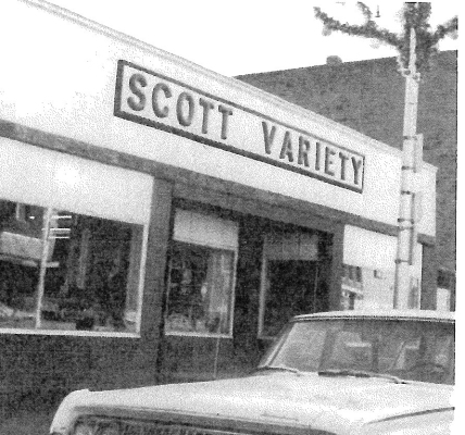 THISYESTERYEAR PICTURE was taken in 1973. Scott Variety was located on the vacant lots on the south side of Main Street. Lucille and C. R. Scott, who taught typing and shorthand at SHS, ran the variety store for many years. Who remembers the bulk candy counter at the front of the store?