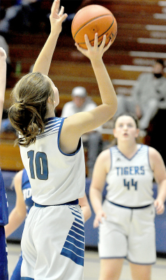 AUBREY KESLER, an eighth grader for the Stockton Junior High Tigers, powers up for two against Norton on November 5th.