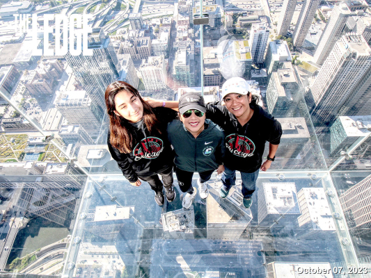 TAKING IN THE VIEW from The Ledge, a 1.4-inch thick glass balcony jutting 4.3 feet from Chicago’s Willis Tower Skydeck’s 103 floor at 1,353 feet from the street below, are Jayana Creighton, Stephanie Hoang, and Fielzah Creighton. Stephanie is one of the four runners from the Runstreak group that Fielzah got to meet.