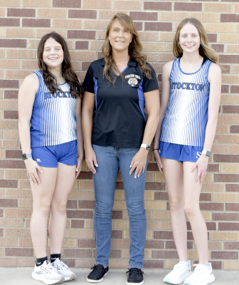 THE 2024 SHS CROSS COUNTRY members are from left: Mia Odle, Janet Kuhlmann (coach), and Cheyenne Hoeting.