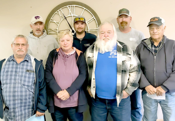 IN RECOGNITION OF NATIONAL SCHOOL BUS SAFETY WEEK (October 19-23), the USD No. 271 School Bus Drivers need to be recognized for their diligence in getting our student/athletes to and from school, as well as the various events, in a safe manner. From left are: Dan Knoll, Chris Kriley, Linda McLaughlin, Michael Carpenter, Mike Rogers, Ray Niblock and Dwight Miller. (Courtesy photo)