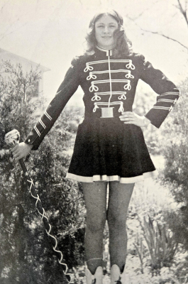 ELIZABETH ZOLLER served as the majorette for SHS during the 1971-1972 school year. She led the band at halftime shows, directed the pep band at assemblies, and marched with the band in downtown parades throughout the school year.