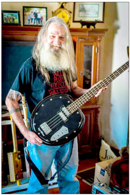 Royce Williams and his cigar-box guitars featured on HaysPost.com