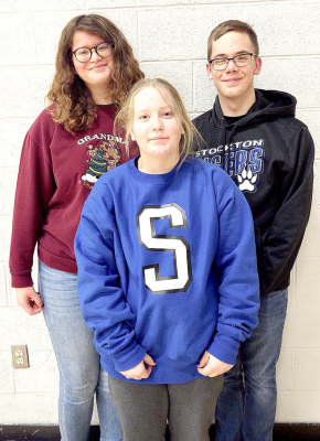SHS STUDENTS (front) Michel Smith (vocal), Emil Benavides (vocal) and Isaac Reed (band) participated in the KMEA Virtual Northwest District Mini-Convention II on Saturday, December 12th.