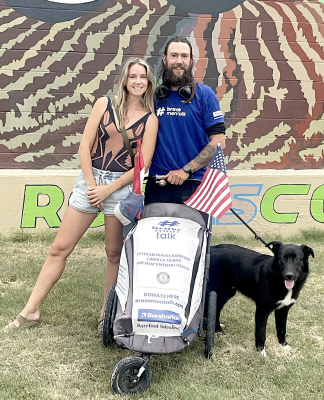 MEREL VAN DER WOUDEN, Anton Nootenboom, and Oreo posed for a picture in front of Stockton’s wall on Main Street when they were in town on Monday, July 1st.