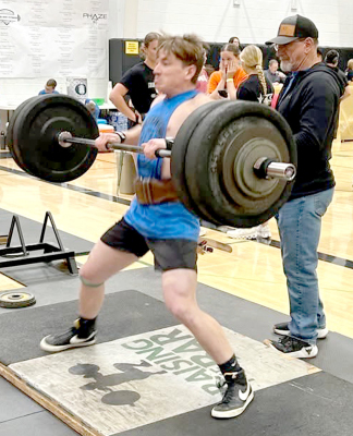 CASON IWANSKI, spotted by Coach Justin Basart, tied the state record in Clean (295 lbs.), and also set a new school record.