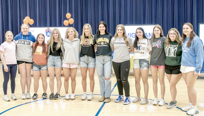 THE 2024 STOCKTON HIGH SCHOOL LADY TIGERS VOLLEYBALL TEAM wished their teammates, Ava Dix, Audrey Kesler, and Brin Muir, well when the girls signed letters of intent to extend their volleyball careers. From left are: Saj Snyder, Brenna Odle, Aidyen Kerr, Jada Martin, Ashlyn Hahn, Ave Dix (Baker University), Audrey Kesler (Highland Community College), Brin Muir (Colby Community College), Bodye Stithem, Teagann Shamburg, Skylar Amlong, and Shae Yohon.