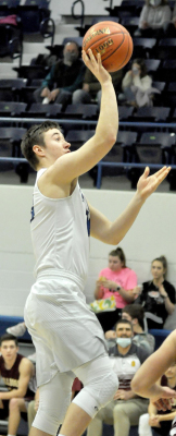 TIGER SENIOR ETHAN MEANS scored 20 points against the Osborne Bulldogs in the February 12 contest played in Stockton.