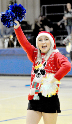 LOOKING FESTIVE, SHS senior Delanee Bedore cheers on the Tigers in their game vs. TMP.