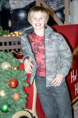 Brodie Kreutzer was just one of the kids in the crowd who waited for Santa’s arrival at Printer’s Park after the Main Street Parade.
