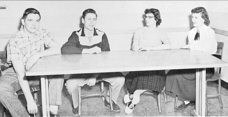 THE 1954 CARDINAL SENIOR OFFICERS were (from left) president Herb Hilgers, treasurer Ed Schrant, vice president Georgiana Noah, and secretary Verlie Fiesen.