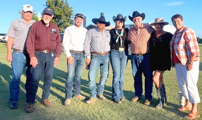 MEMBERS of the Rooks County Historical Society attended the Dane G. Hansen Labor Day Celebration on Saturday, Sept. 1, to hear to cowboy poetry presented by Rick Gianni and Anna Marie Biggs, both of Stockton. Pictured from left to right are Steve Melton, Leo Oliva, Colton Williams, Justin Russ, Anna Marie Bigge, Rick Gianni, Julie Hartner, and Linda Melton.