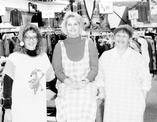 ALL READY TO HELP the Maris Store customers during the 1989 Santa Madness event were (from left) Mrs. Brad Meredith, Mrs. Pam Muir, and Mrs. Linda Jones.