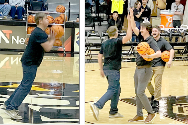 HUDSON MUIR walked out of Gross Memorial Coliseum $750 richer after sinking a half-court shot in a Nex-Tech promotion. Of course, his feat deserved high fives from some of the FHSU staff.