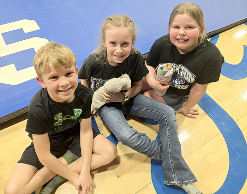 CARSON RIENER, FINLEY PETERSON, AND BRAYLEE MUIR assisted at the Stockton Junior High home wrestling meet on Thursday, February 12th. They served as towel timers for the referees during all three rounds of the matches.