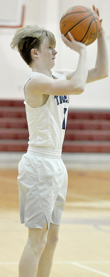 CAMERON LINDSEY sank two, second-half treys, helping the Tigers to a 53-48 win over Plainville in the MCL Tourney game on January 18 in Plainville.