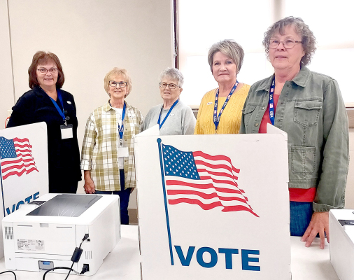 SETTING UP the voting booths on Election Day, November 7th, were (from left) Pat Cook, Janese Townley, Diane Maddy, Connie Jenkins, and Sharon Pettijohn.